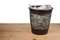 Trash can with crumpled money Royalty Free Stock Photo