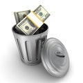 Trash can full of dollars packs on white Royalty Free Stock Photo