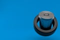 Trash can inside car tire Royalty Free Stock Photo