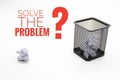 trash can with question marks and sentences Solve problems.Selective focus. Royalty Free Stock Photo