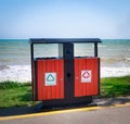 Trash can with the separation of garbage, to save the ecology of the environment on the beach promenade