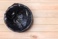 Empty Bin on Wooden Background. Trash Can Top View. Garbage Basket. Rubbish Black Bag in a Trash Can. Empty Rubbish Bin. Waste Can