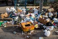 Trash cans full of trash on the streets of Kherson, Ukraine - March 21, 2023