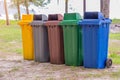 trash cans in the park beside the walk way Royalty Free Stock Photo