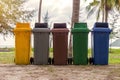 trash cans in the park beside the walk way Royalty Free Stock Photo