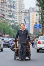 Trash collector on the street, Dalian, China