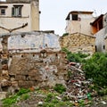 Trash and crumbling wall in a Palermo neighborhood