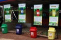 Trash different colors, red, green, blue, yellow for waste sorting, waste recycling, Thailand