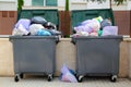 Trash garbage full container in street Royalty Free Stock Photo