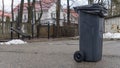 Trash Garbage Full Container In Street. Do not litter on the street in the city. Ecological problem concept.