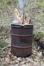 Trash and Garbage in Old Rusty Burning Barrel Royalty Free Stock Photo