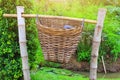 Trash made with bamboo basket, natural background Garbage dumping concept