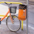 Trash metal orange waste and bicycle