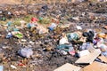 Trash piles at an improvised and illicit dump site.