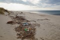 Trash and plastic bottles on the beach Royalty Free Stock Photo