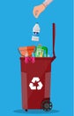 Trash recycle bin container full of plastic things Royalty Free Stock Photo