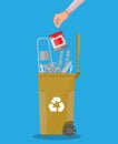 Trash recycle bin for garbage full of metal things
