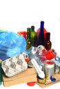 Trash for recycling with,paper, glass bottles, cans, plastic bot Royalty Free Stock Photo