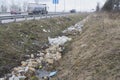 Trash in a roadside ditch Royalty Free Stock Photo