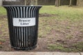 Trash timber litter bin Bruscar in a public park Royalty Free Stock Photo