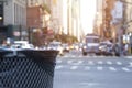 Trash waste bin on new york city street with people and cars wit Royalty Free Stock Photo