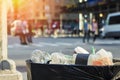 Trash waste bin on new york city street with people Royalty Free Stock Photo