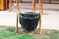 Trashcan bin bamboo basket in the park. Royalty Free Stock Photo