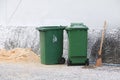 Trashcan green rubbish bin dustbins outside wall background road