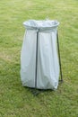 Trashcan - a plastic garbage bag on an iron frame