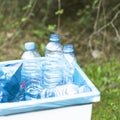 trashcan with plastic garbage outdoors. High quality photo