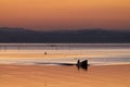 Trasimeno lake at sunset with a man on a little boat Royalty Free Stock Photo