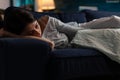 Traumatised depressed woman crying lying on sofa Royalty Free Stock Photo