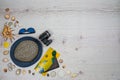 Travel accessories on the white wooden boards with seashells