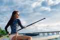 Travel Adventure. Woman Paddling On Surfing Board.