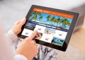 Travel agency`s website on tablet computer