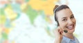 Travel agent woman wearing headset in front of world map Royalty Free Stock Photo