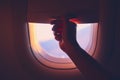 Close-up airplane window at sunrise Royalty Free Stock Photo