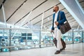 Travel, airport and bag with a business black man walking in a terminal for global success. Manager, mockup and flight Royalty Free Stock Photo