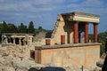 Travel around Europe by car. An ancient ruins of Greek Knossos palace and group of tourists. Royalty Free Stock Photo