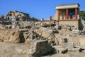 Travel around Europe by car. An ancient ruins of Greek Knossos palace and group of tourists. Royalty Free Stock Photo