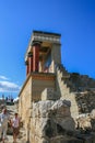 Travel around Europe by car. An ancient ruins of Greek Knossos palace and group of tourists. Royalty Free Stock Photo