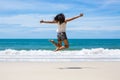 Travel asia woman jumping on sea beach Royalty Free Stock Photo