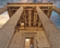 Sundown in Athens Greece, ionic order ancient temple on Acropolis and dramatic sky background. Royalty Free Stock Photo