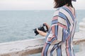 Travel background beautiful photographer young women hold camera