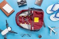 Travel Backpacker objects and accessories on blue Royalty Free Stock Photo