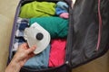 Travel Bag Packed With Clothes, And Medical Masks Royalty Free Stock Photo