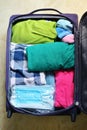 Travel Bag Packed With Clothes, And Medical Masks Royalty Free Stock Photo