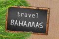 Travel Bahamas palm trees and blackboard on sandy beach Royalty Free Stock Photo