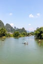 Travel on bamboo rafts in famous scenic spots of Yuli Gallery of Yulong River in Guilin, Guangxi Royalty Free Stock Photo