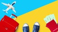 Travel banner, summer holidays, vacation concept, tourism: white airplane, blue sky, red suitcase, passport, boarding pass, shoes Royalty Free Stock Photo